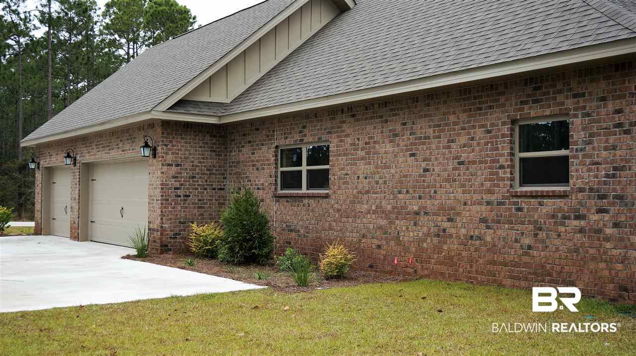 18413 Treasure Oaks Road Gulf Shores, AL 36542 - Photo 3 of 31 Three-car garage