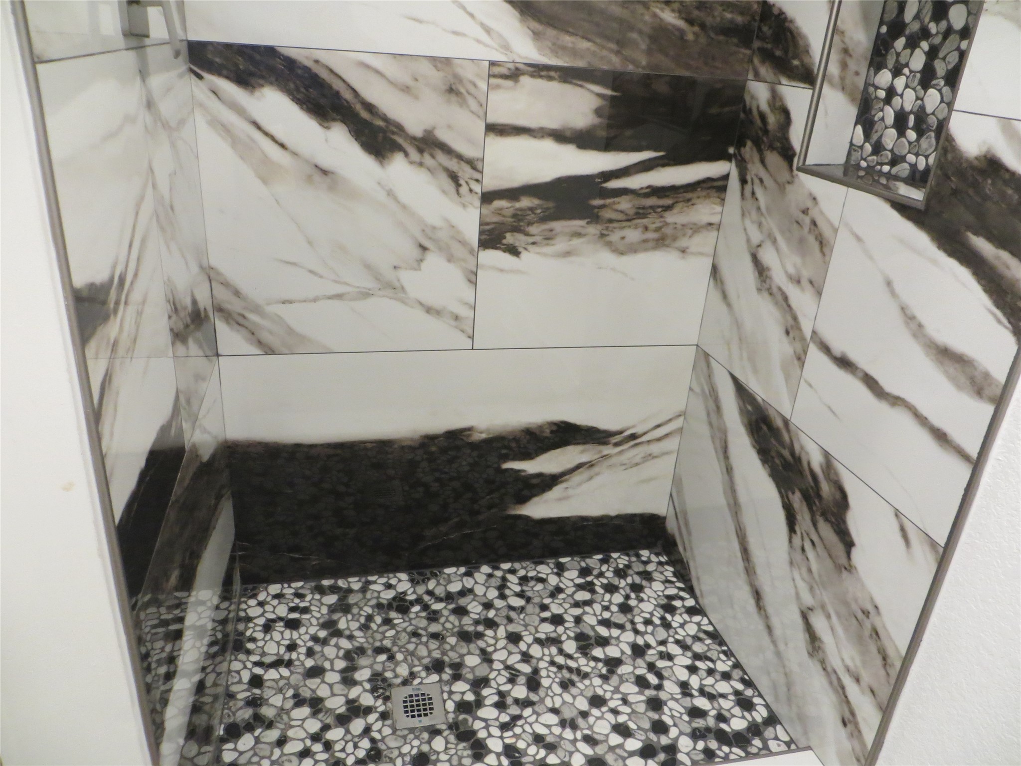 2910 Rose Street Pasadena, TX 77503 - Photo 14 of 18 a bathroom with a sink and a shower