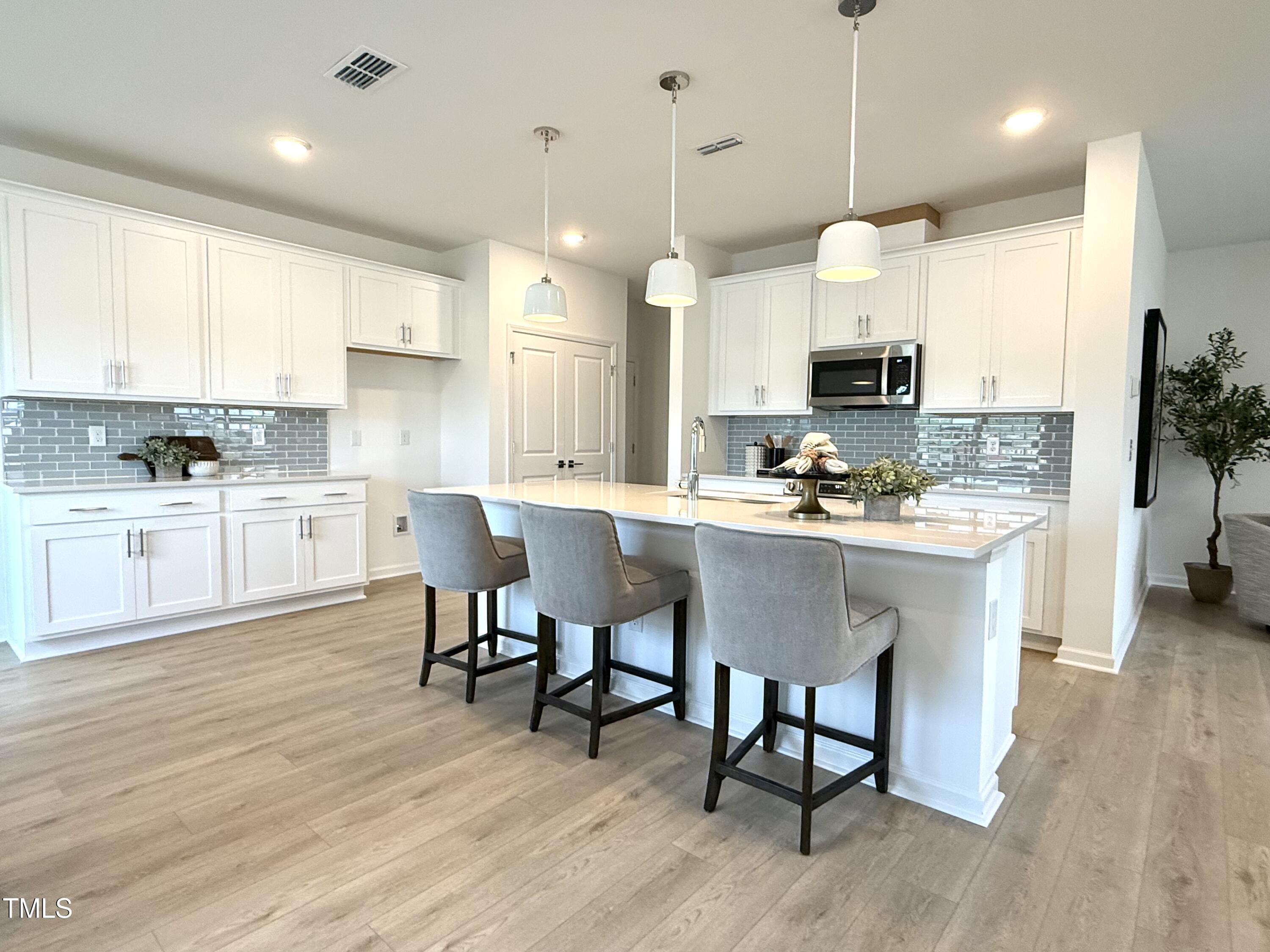 2880 Quarry Road, Unit 163 Rolesville, NC 27571 - Photo 10 of 60 The Coastal Collection makes this home light and bright! Staged!