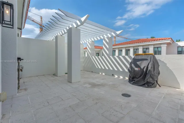 a view of a house with a patio
