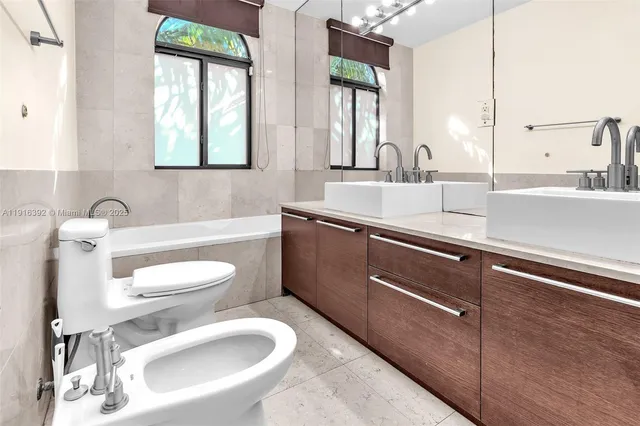 a room with furniture and a wooden floor