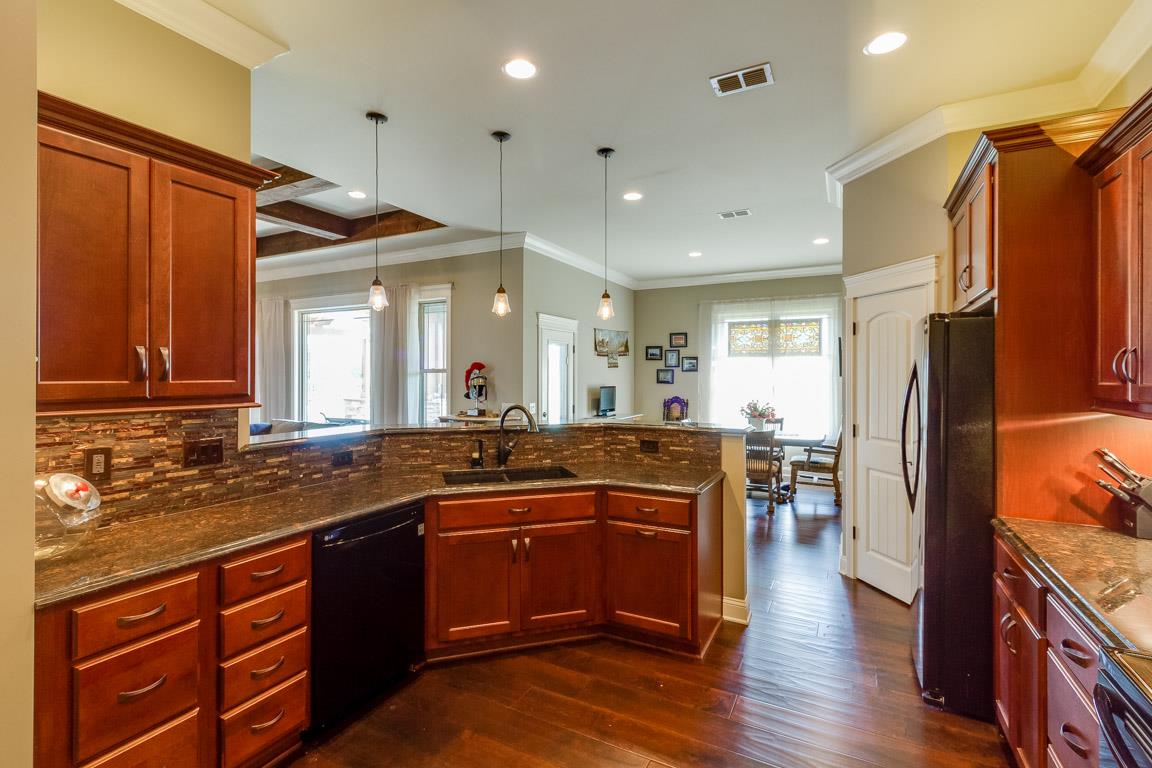 4680 Sango Road Clarksville, TN 37043 - Photo 12 of 29 a kitchen with lots of counter top space and stainless steel appliances
