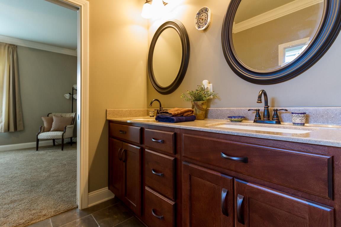 4680 Sango Road Clarksville, TN 37043 - Photo 19 of 29 a bathroom with a sink and a mirror