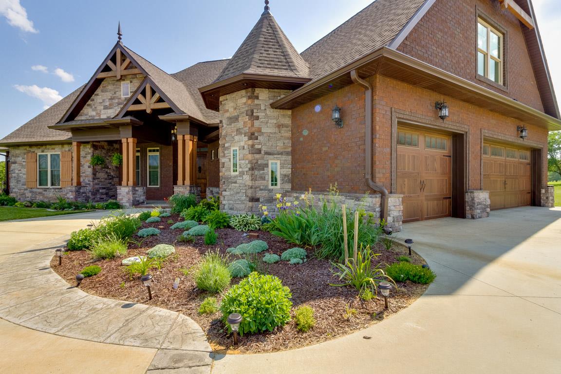 4680 Sango Road Clarksville, TN 37043 - Photo 2 of 29 a front view of a house with garden