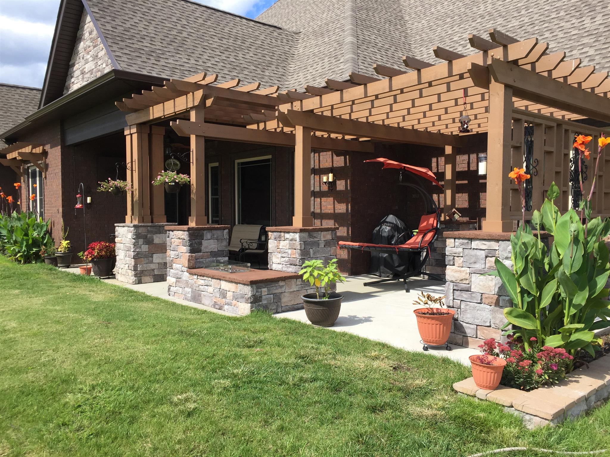 4680 Sango Road Clarksville, TN 37043 - Photo 25 of 29 a front view of a house with sitting area and garden