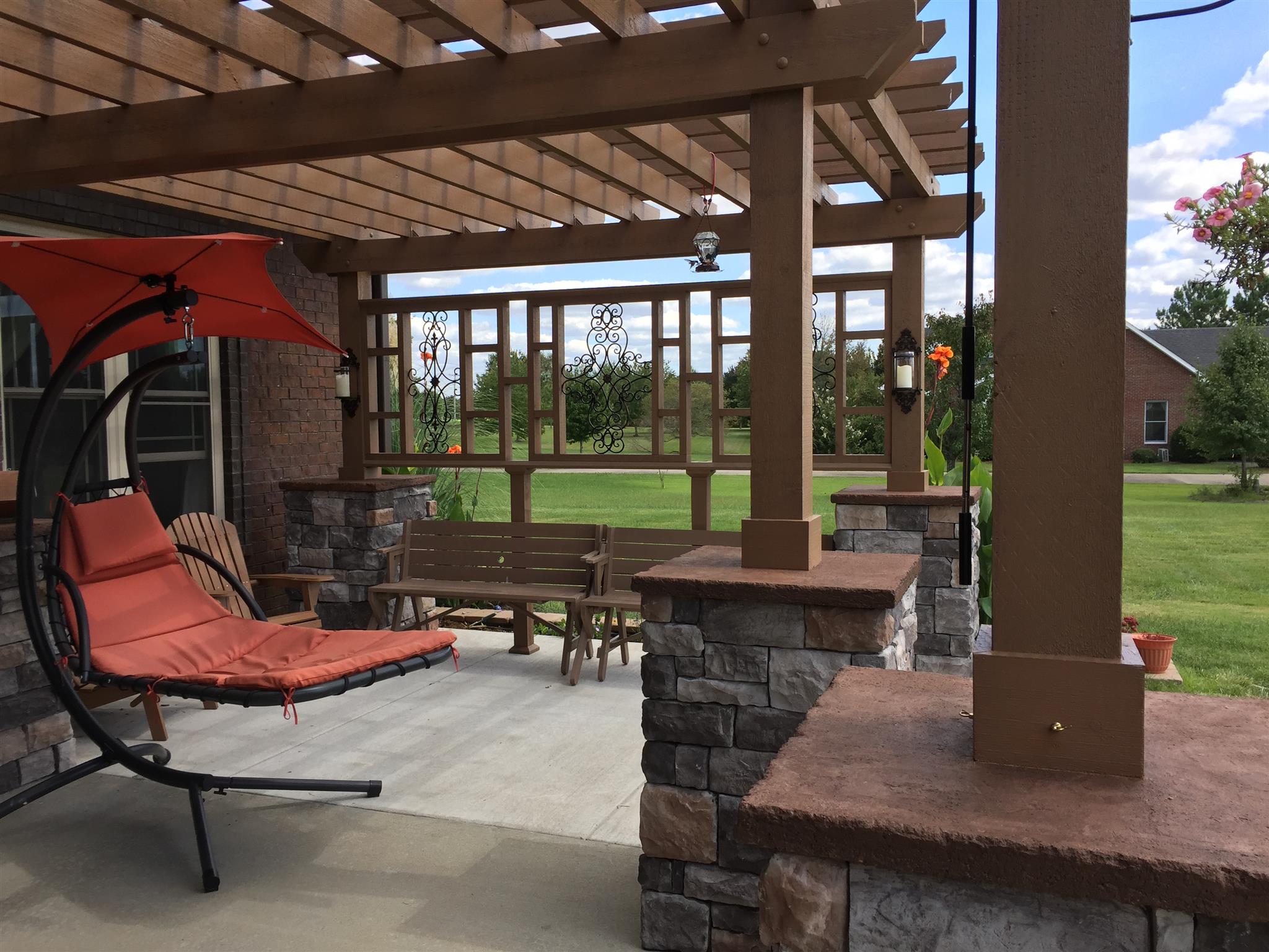 4680 Sango Road Clarksville, TN 37043 - Photo 28 of 29 a view of a patio with a table chairs and a backyard