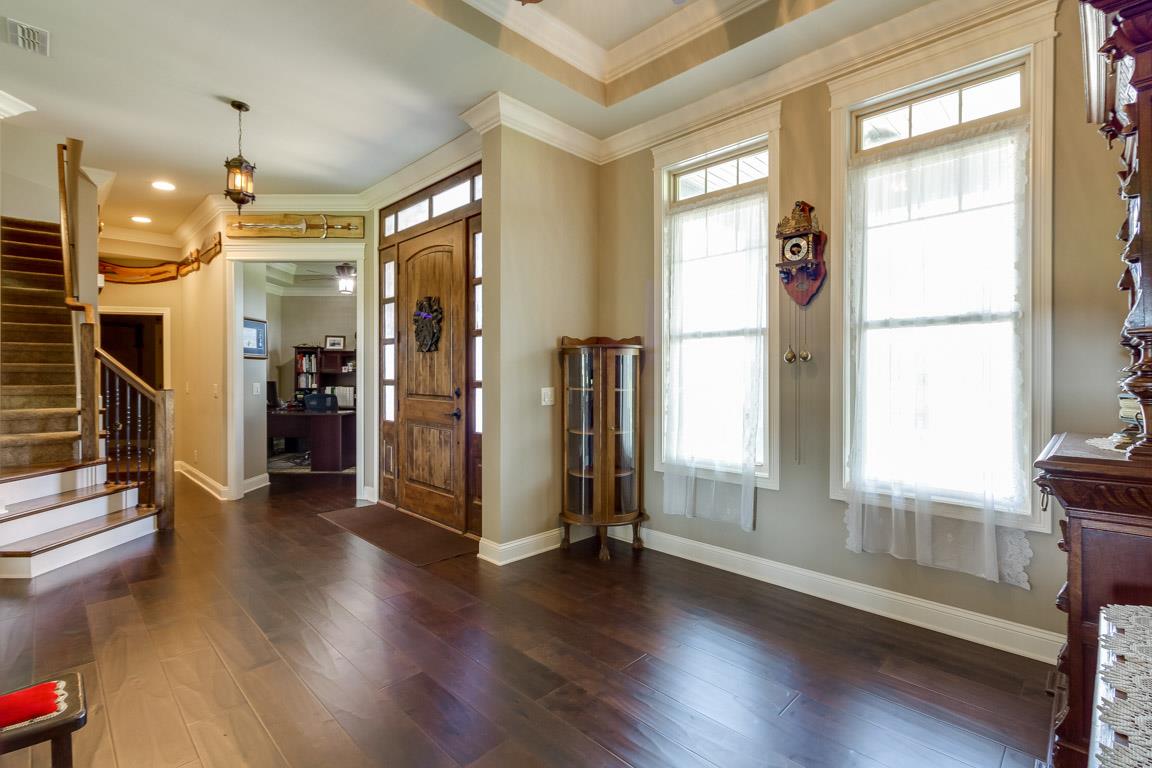 4680 Sango Road Clarksville, TN 37043 - Photo 3 of 29 a view of an entryway with wooden floor and windows