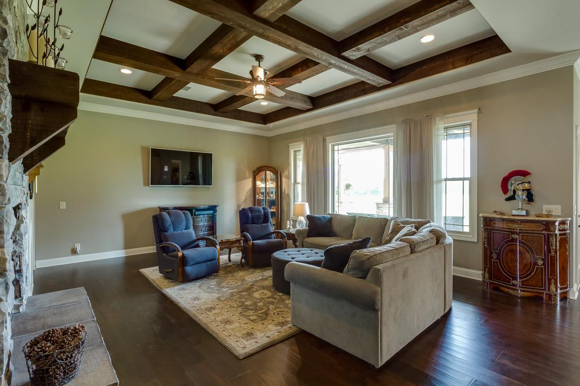 4680 Sango Road Clarksville, TN 37043 - Photo 6 of 29 a living room with furniture and a flat screen tv