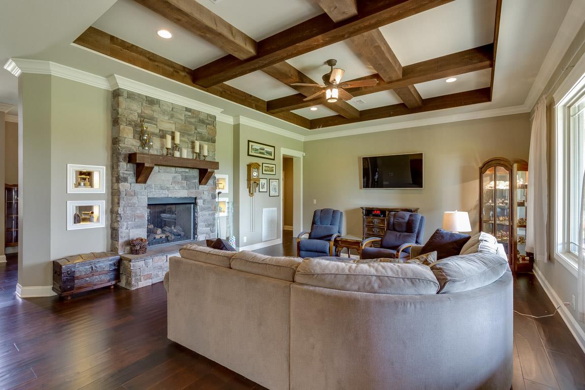4680 Sango Road Clarksville, TN 37043 - Photo 7 of 29 a living room with fireplace furniture and a flat screen tv