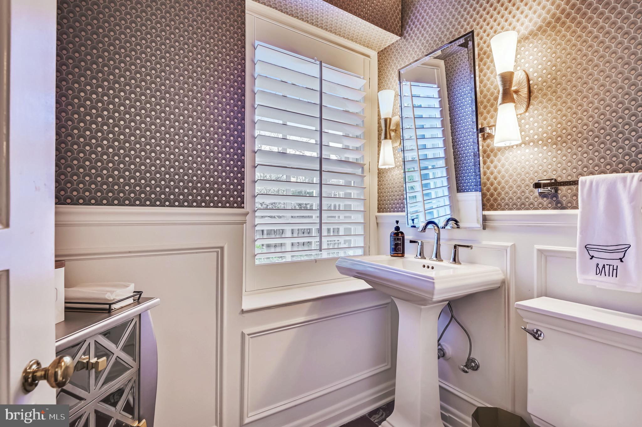 5217 Springlake Way Baltimore, MD 21212 - Photo 28 of 62 First floor powder room off of foyer