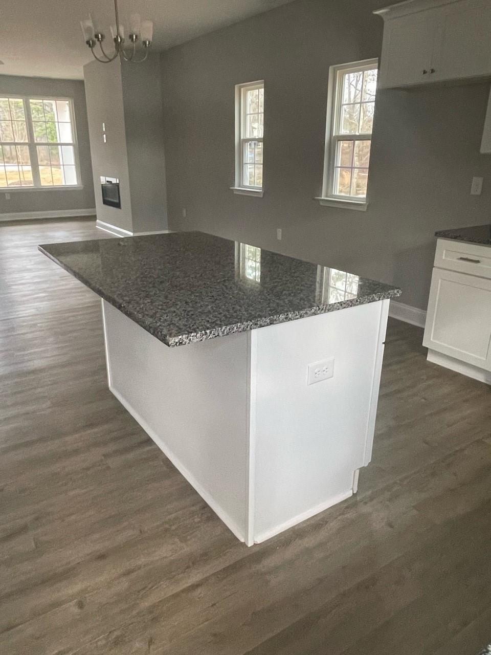 2001 Barkley Circle Monroe, NC 28112 - Photo 16 of 20 a view of a kitchen cabinets and wooden floor