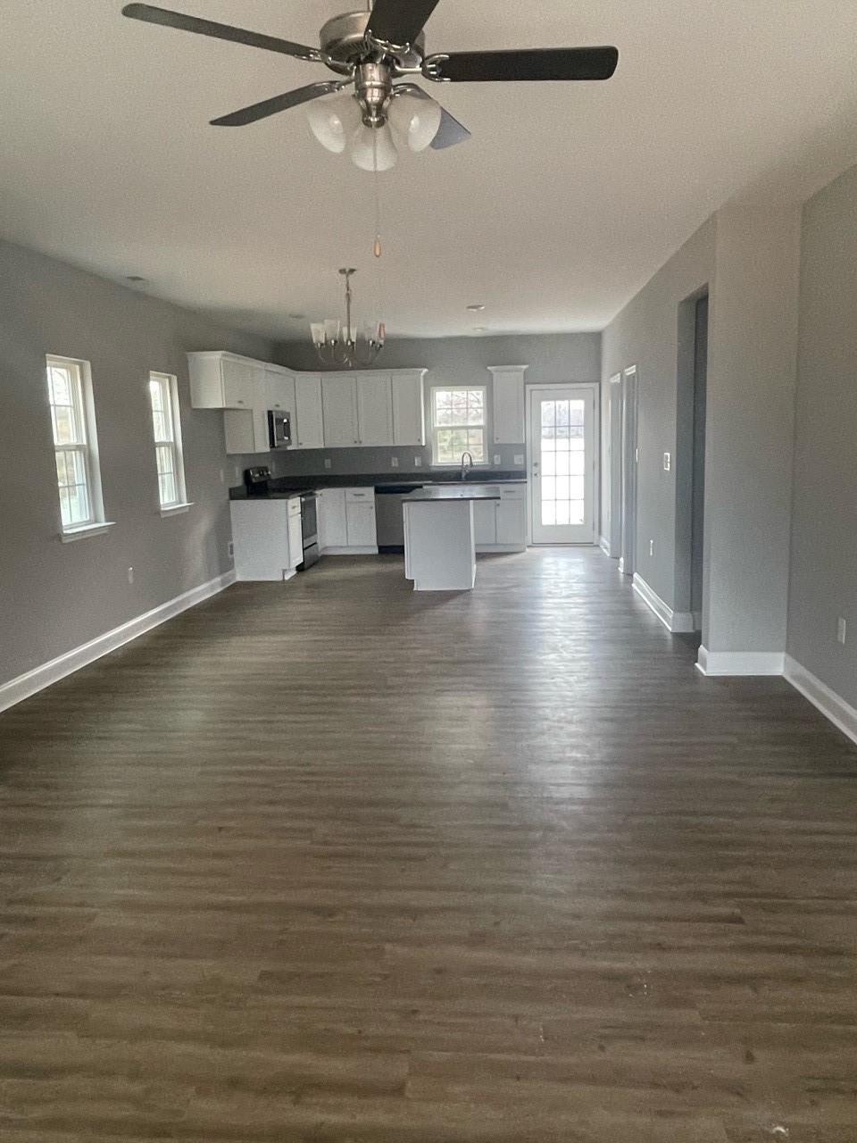 2001 Barkley Circle Monroe, NC 28112 - Photo 20 of 20 a view of empty room with wooden floor and fan
