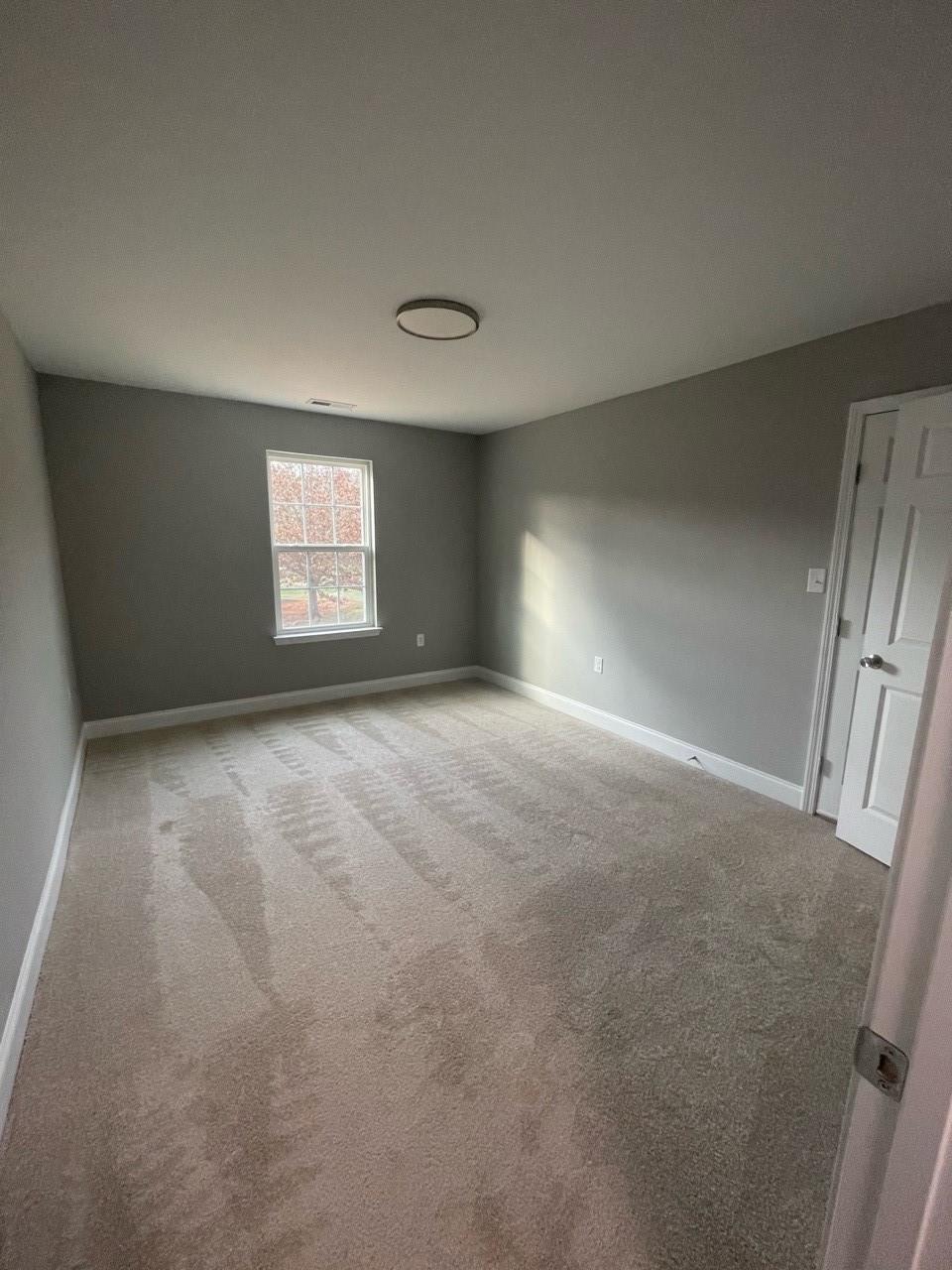 2001 Barkley Circle Monroe, NC 28112 - Photo 7 of 20 an empty room with windows