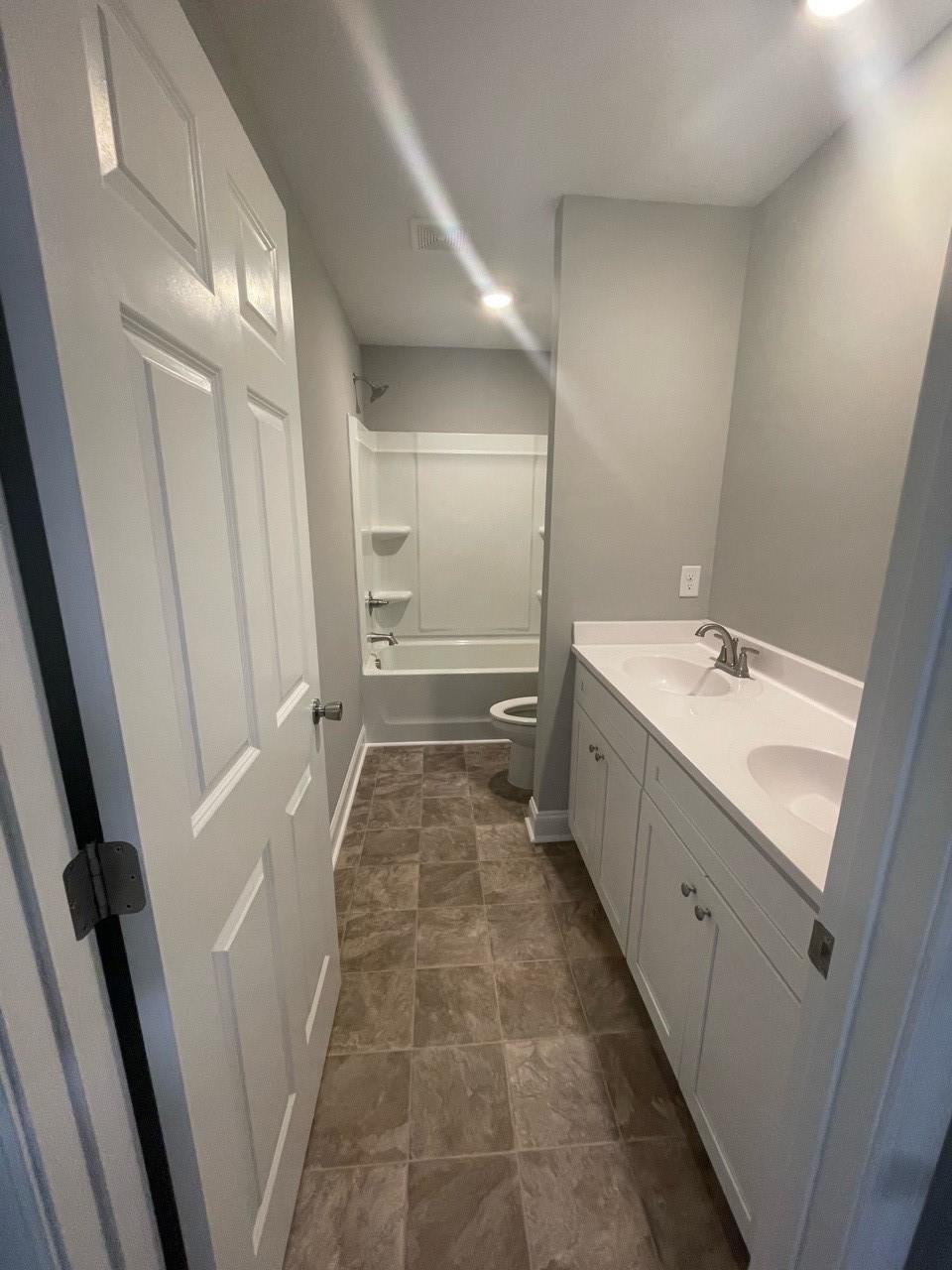 2001 Barkley Circle Monroe, NC 28112 - Photo 8 of 20 a bathroom with a sink a mirror and a vanity