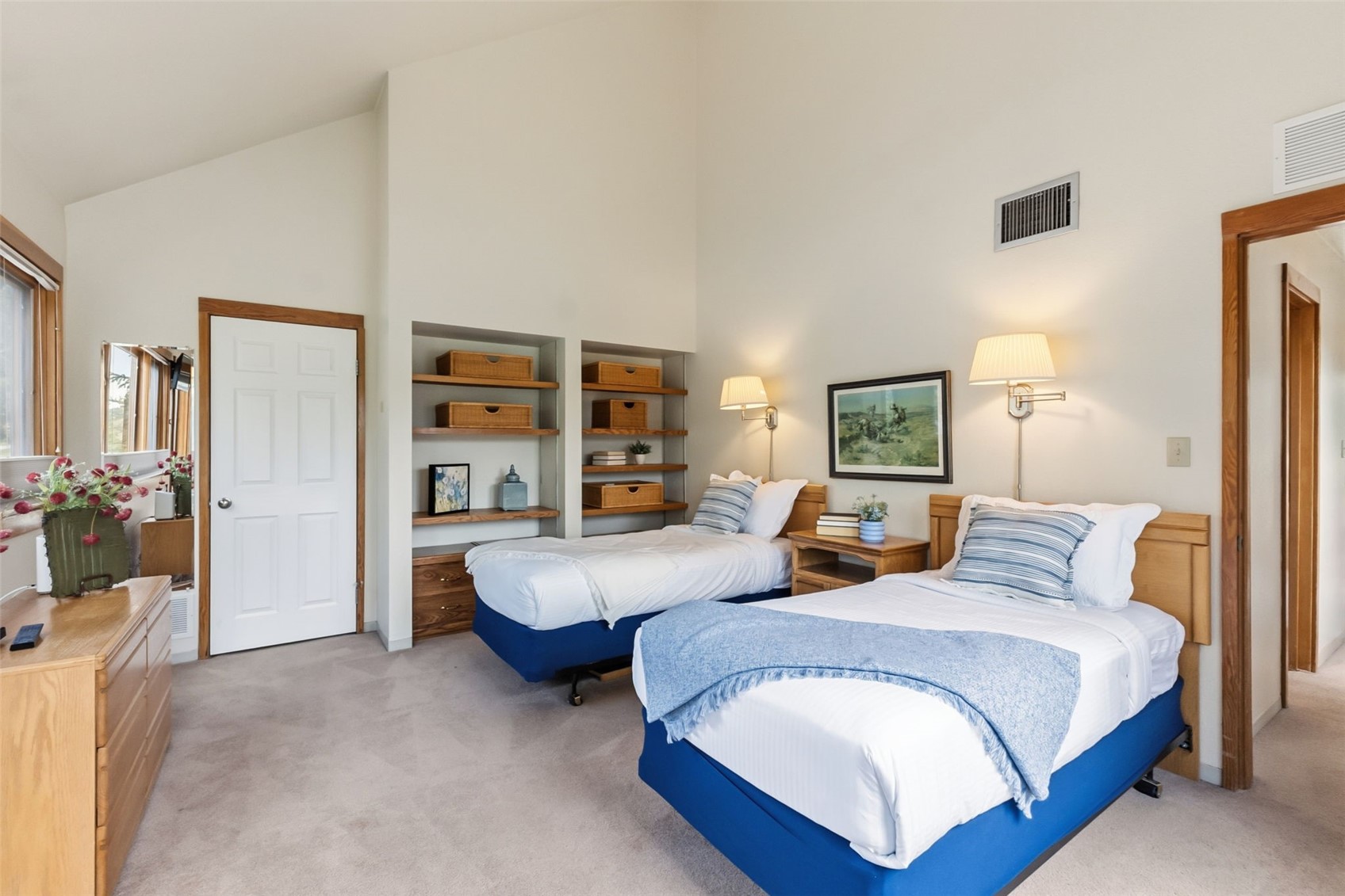 30 Tennis Club Road, Unit 1608 Keystone, CO 80435 - Photo 23 of 29 a spacious bedroom with two bed and a large mirror