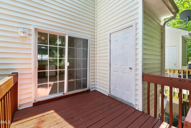 a view of front door with wooden floor