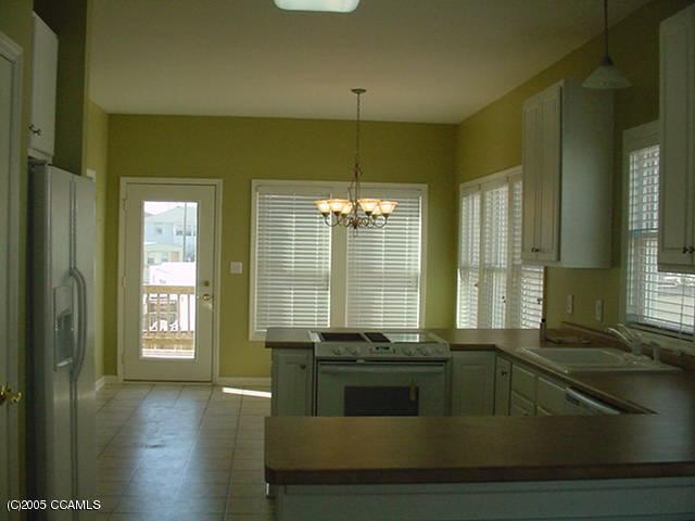 408 West Fort Macon Road, Unit B Atlantic Beach, NC 28512 - Photo 6 of 13 Open view Kitchen-Dining