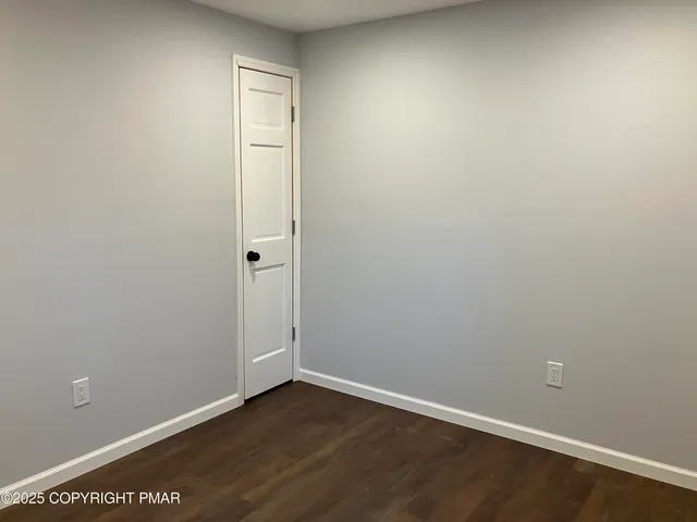 a bathroom with a sink a mirror and vanity