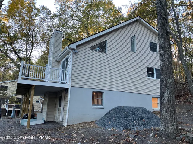 a view of a house with white door