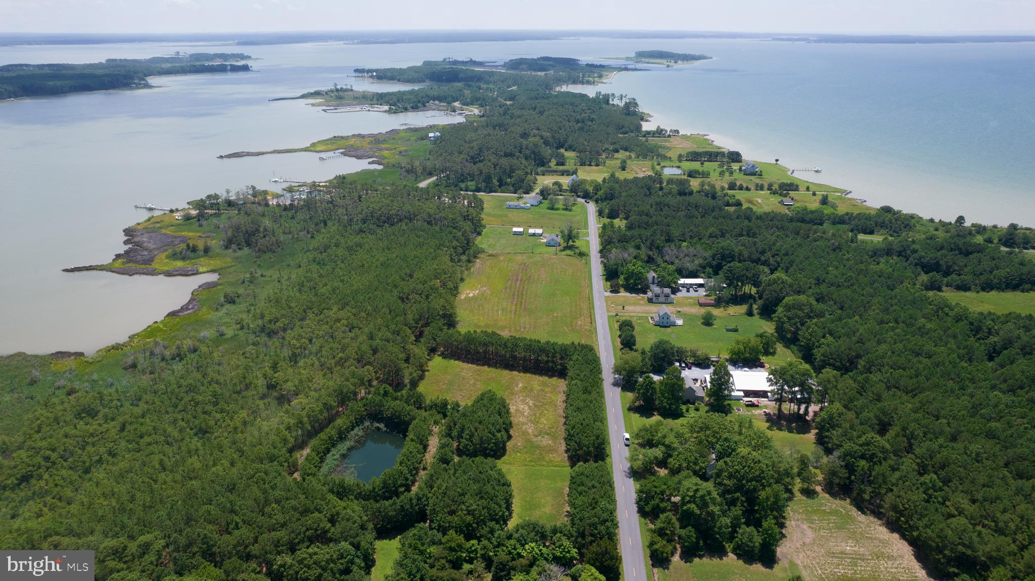 View of Lot (w/pond on left) showing Creek & Bay