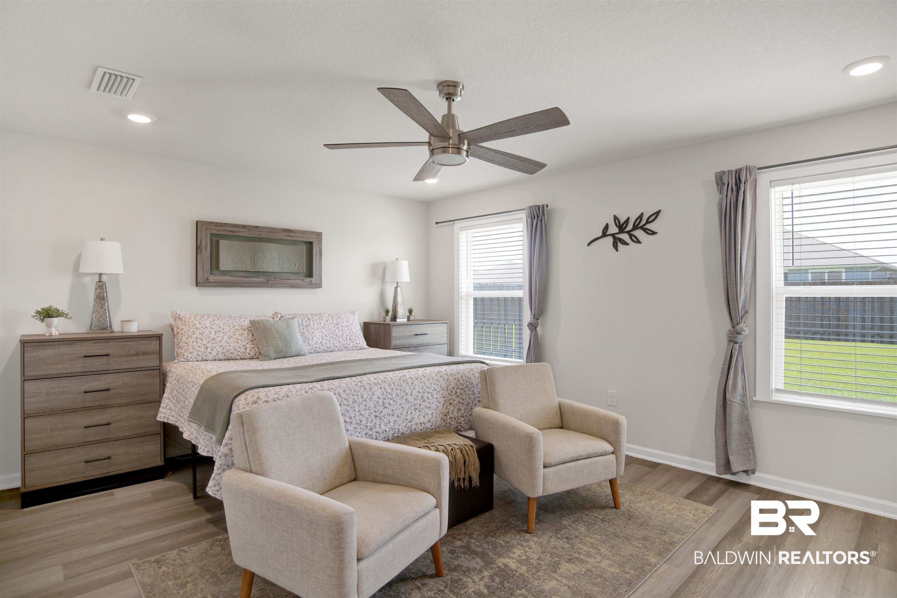22301 Early Dawn Circle Foley, AL 36535 - Photo 17 of 45 Spacious room featuring wood-finish flooring, recessed lighting, and a ceiling fan