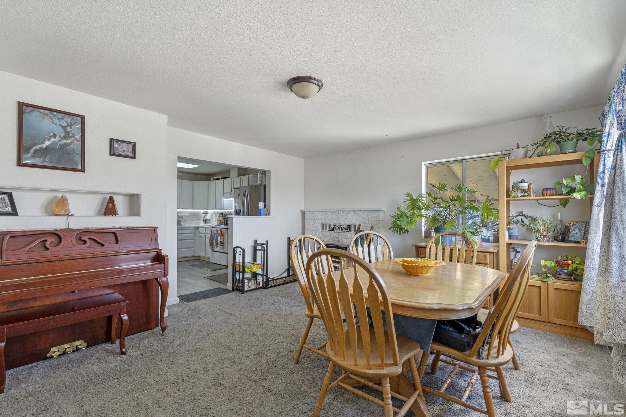 1855 Desna Street Reno, NV 89512 - Photo 3 of 35 a dining room with furniture and window