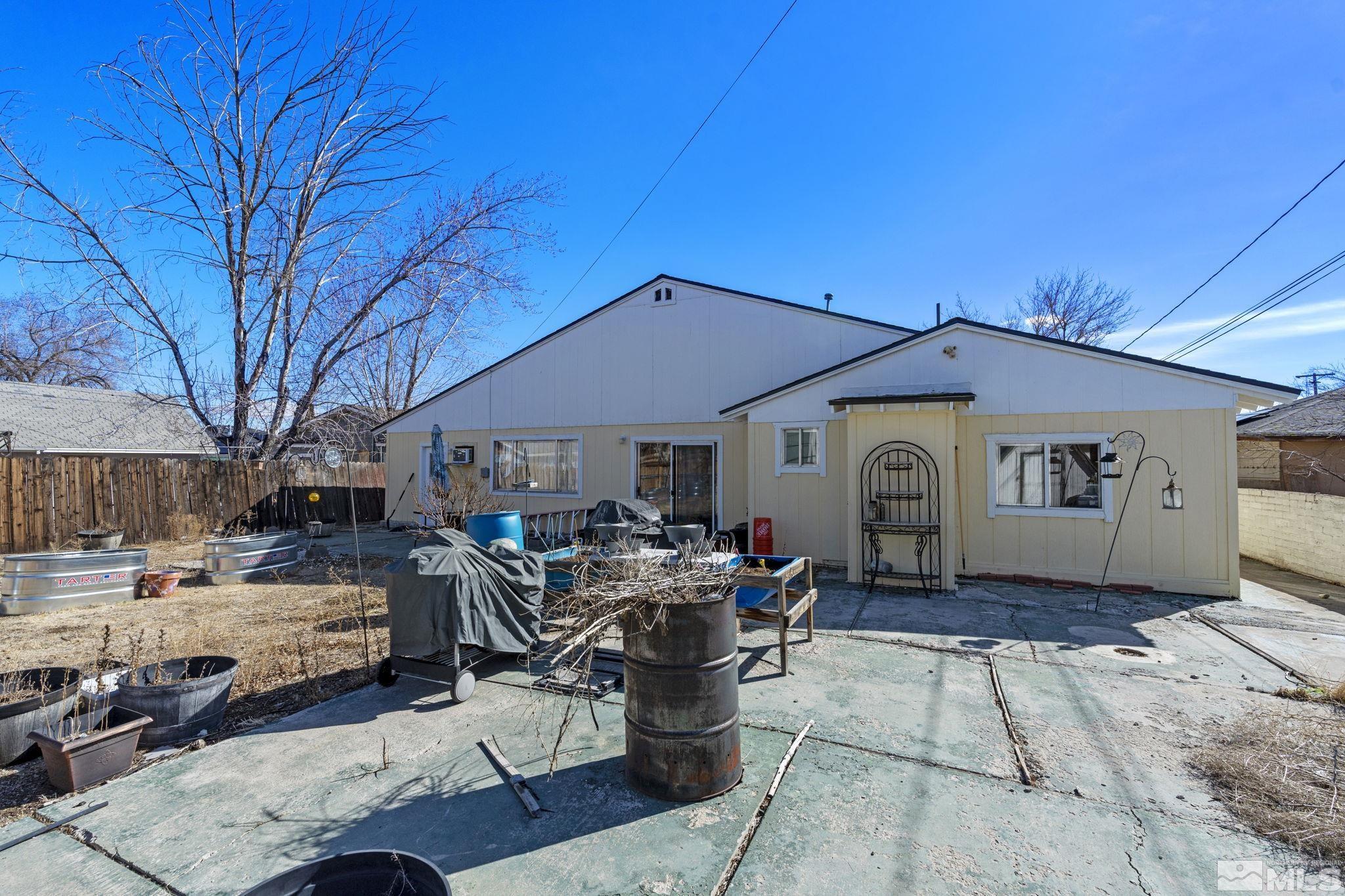 1855 Desna Street Reno, NV 89512 - Photo 31 of 35 a front view of a house with garden