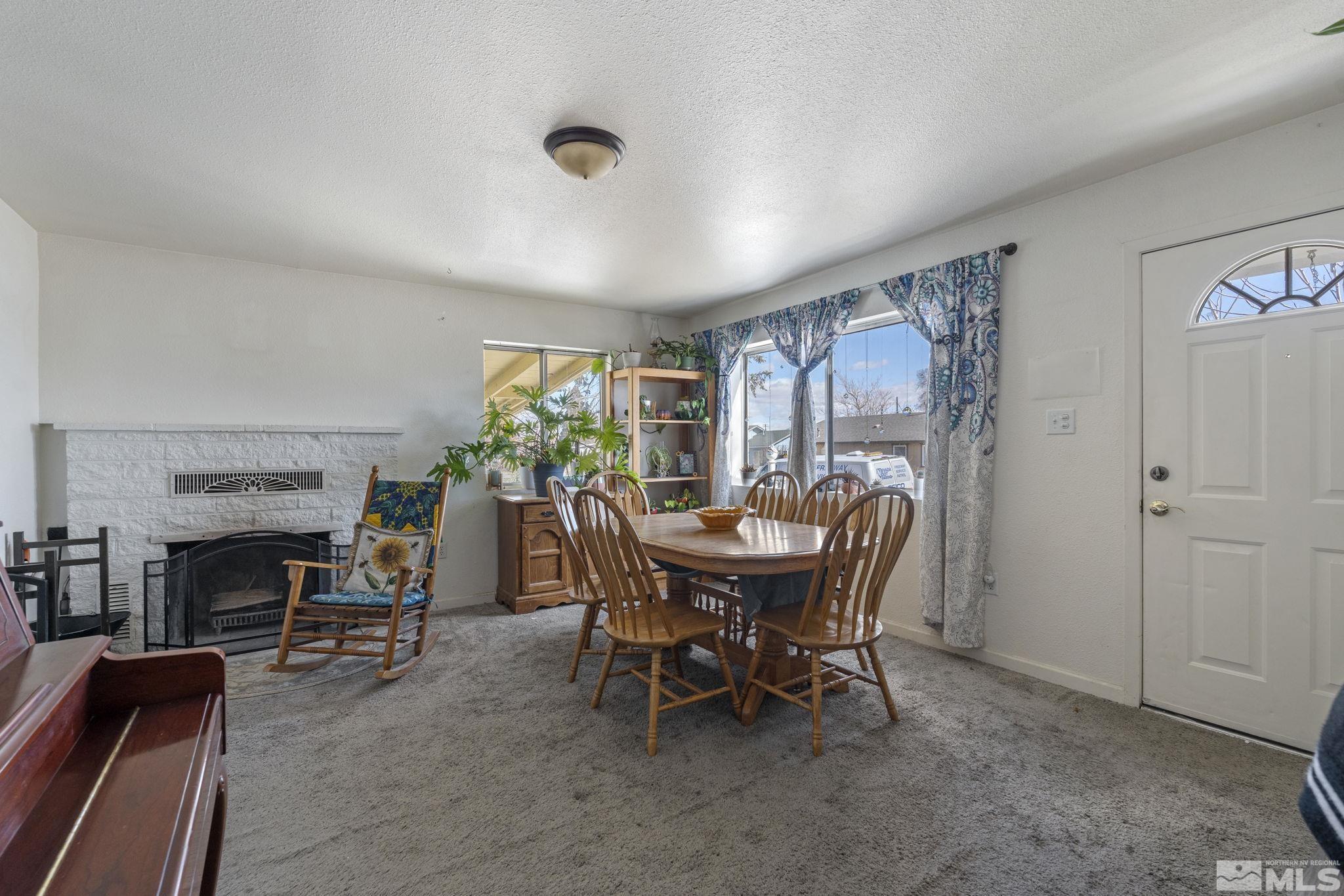 1855 Desna Street Reno, NV 89512 - Photo 5 of 35 a dining room with furniture and window