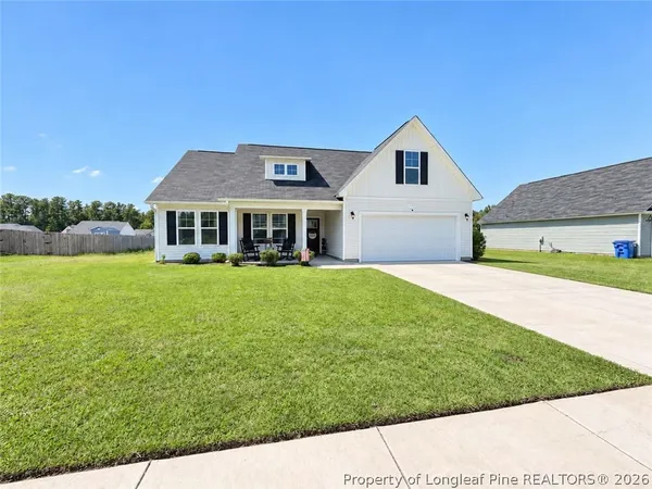 a house view with a garden space