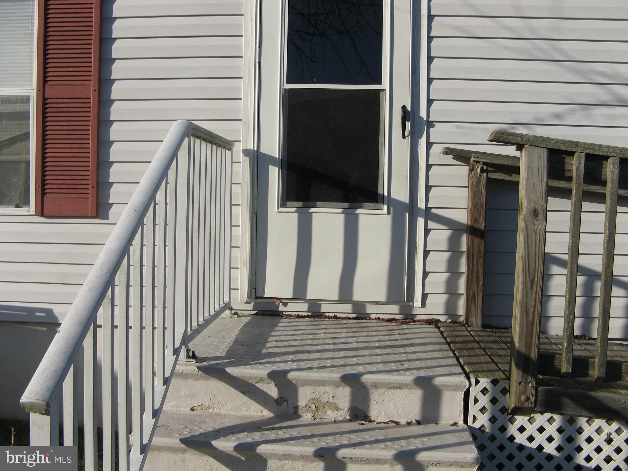 37037 Canvasback Road Selbyville, DE 19975 - Photo 26 of 39 Front door