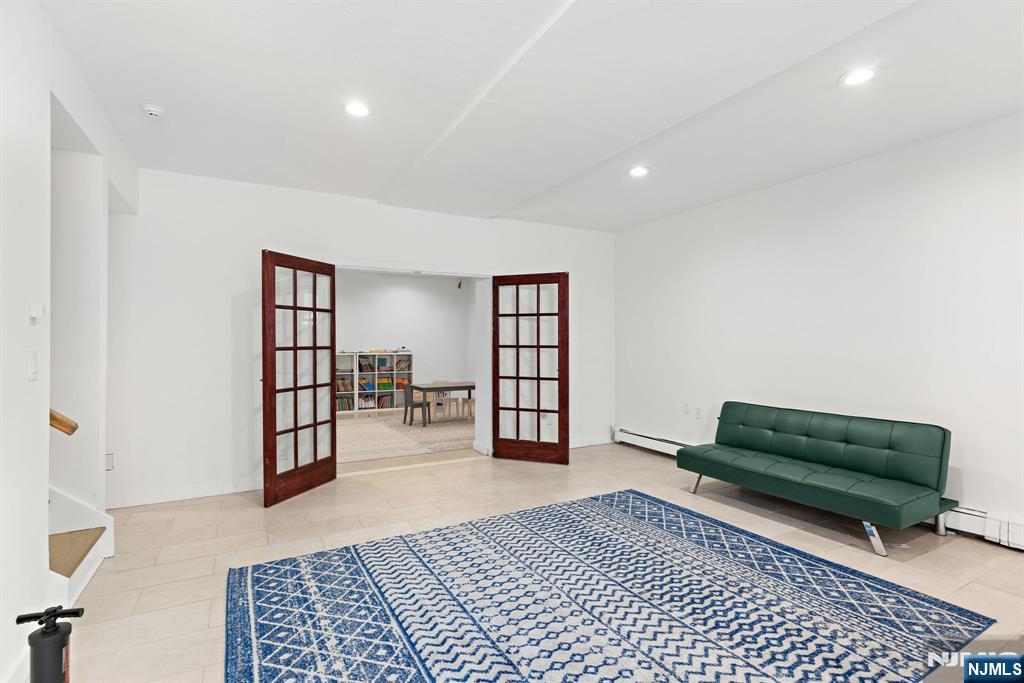 1 Hemlock Drive Cresskill, NJ 07626 - Photo 18 of 26 a living room with furniture and a rug