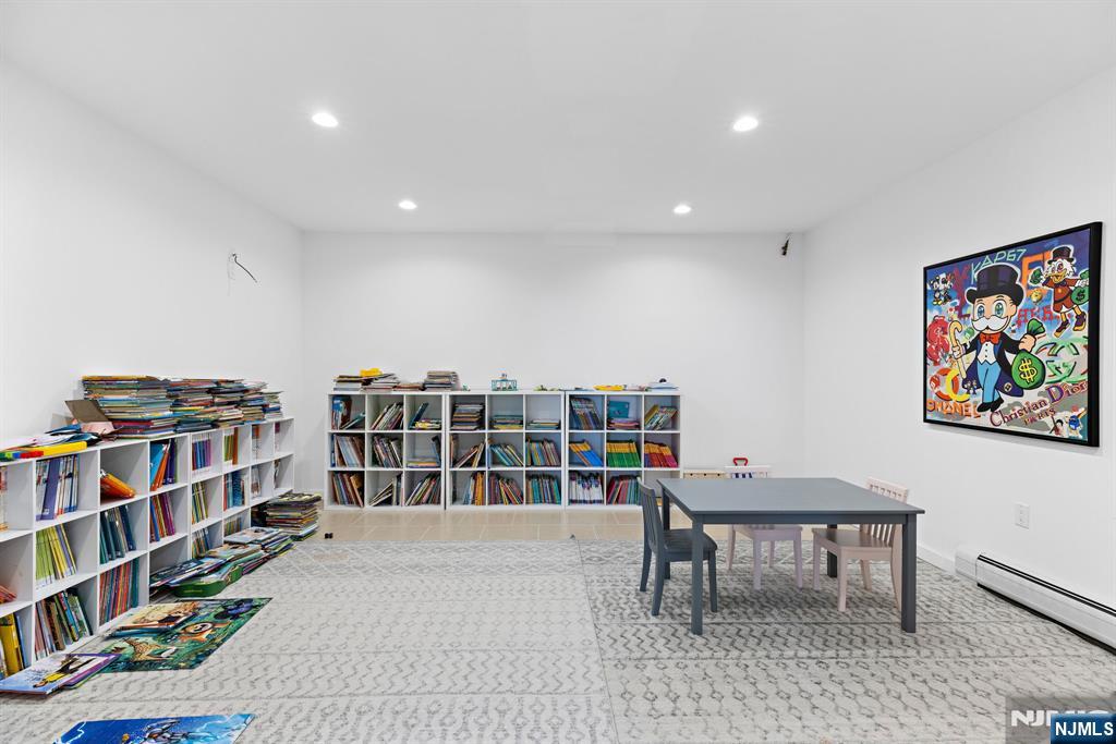 1 Hemlock Drive Cresskill, NJ 07626 - Photo 20 of 26 a workspace with furniture and book shelf