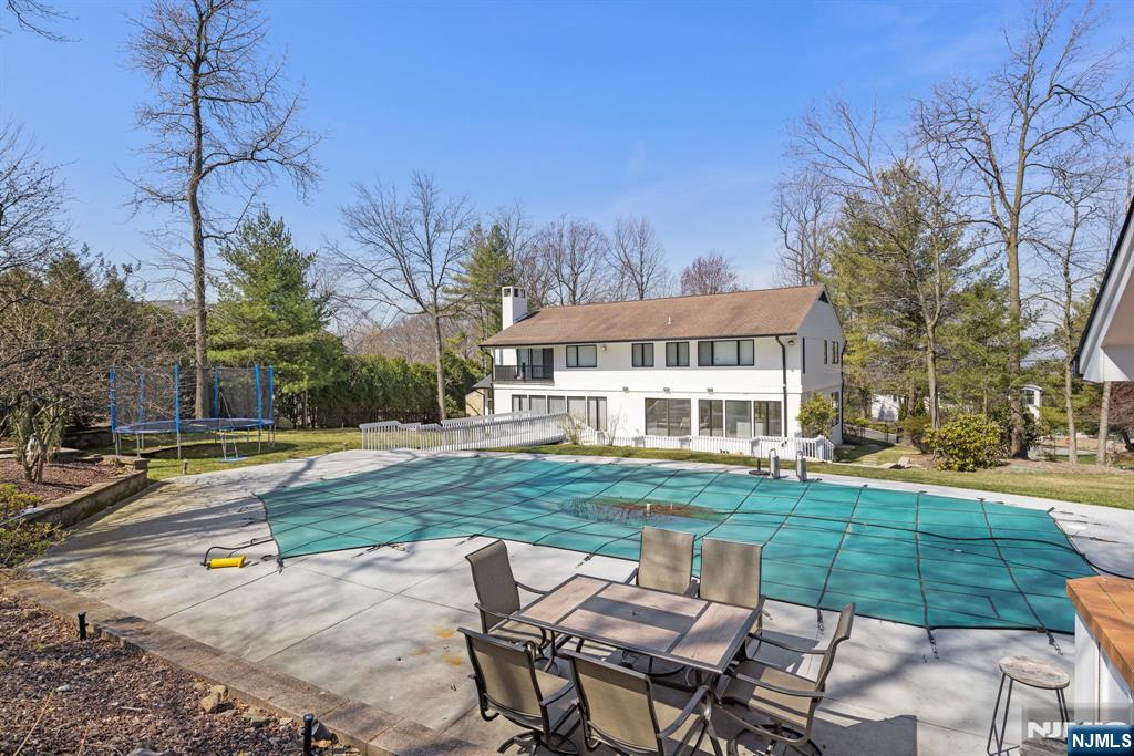 1 Hemlock Drive Cresskill, NJ 07626 - Photo 3 of 26 a view of a house with backyard and sitting area