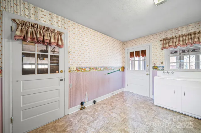 a view of hallway with stairs