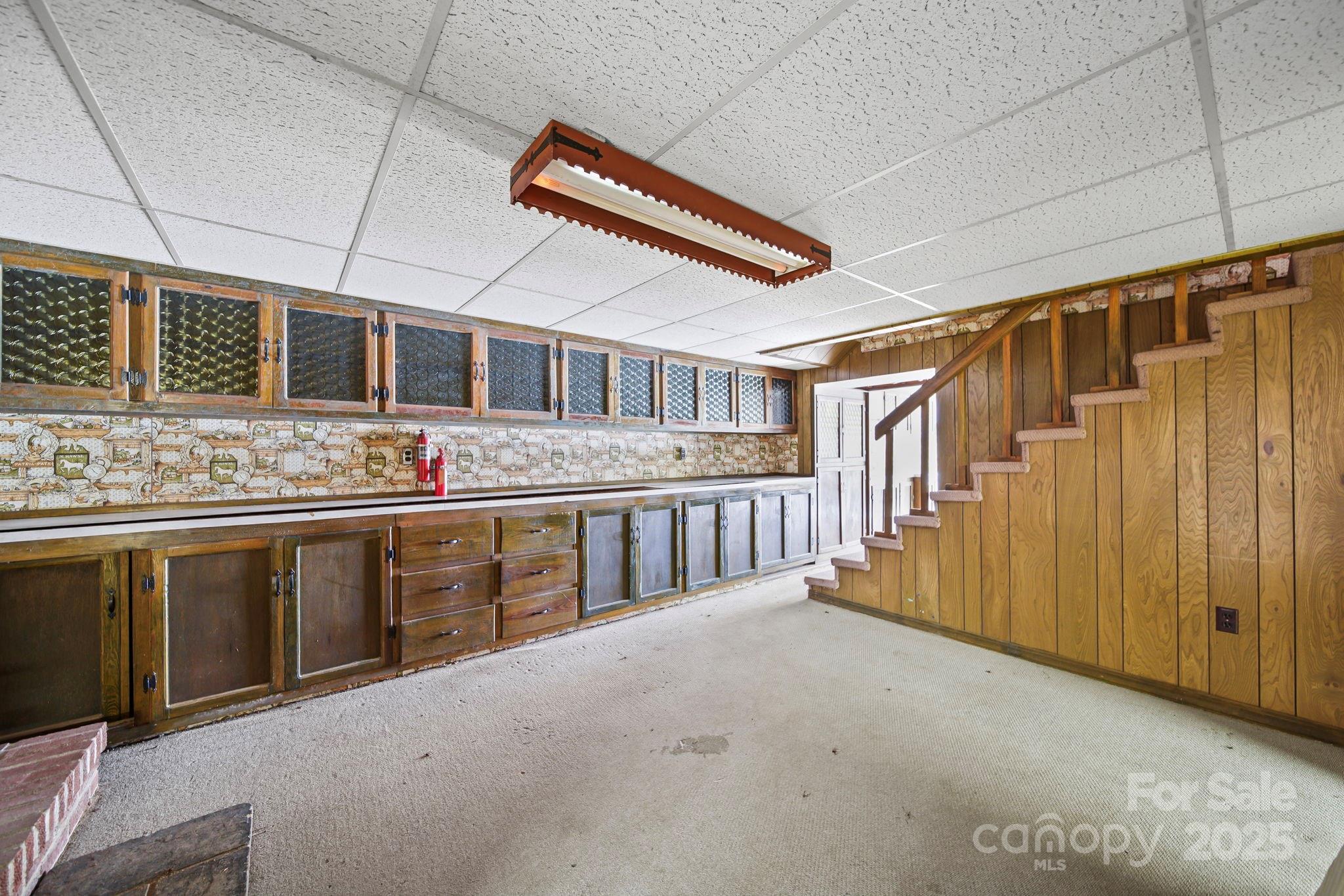 1223 Walker Road Mount Pleasant, NC 28124 - Photo 32 of 48 a kitchen with stainless steel appliances granite countertop a stove and cabinets