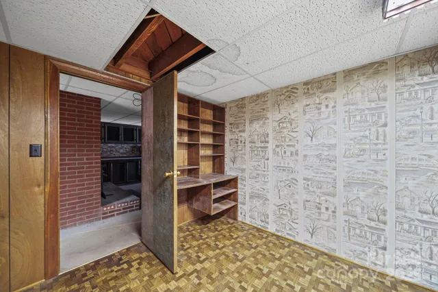 a view of empty room with storage