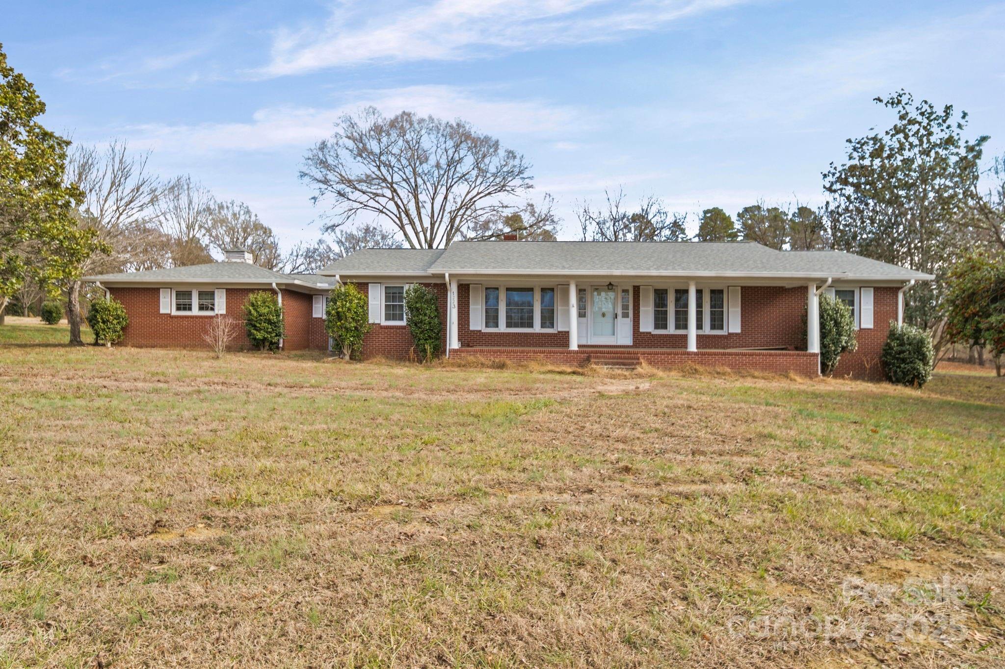 1223 Walker Road Mount Pleasant, NC 28124 - Photo 37 of 48 front view of a house with a yard