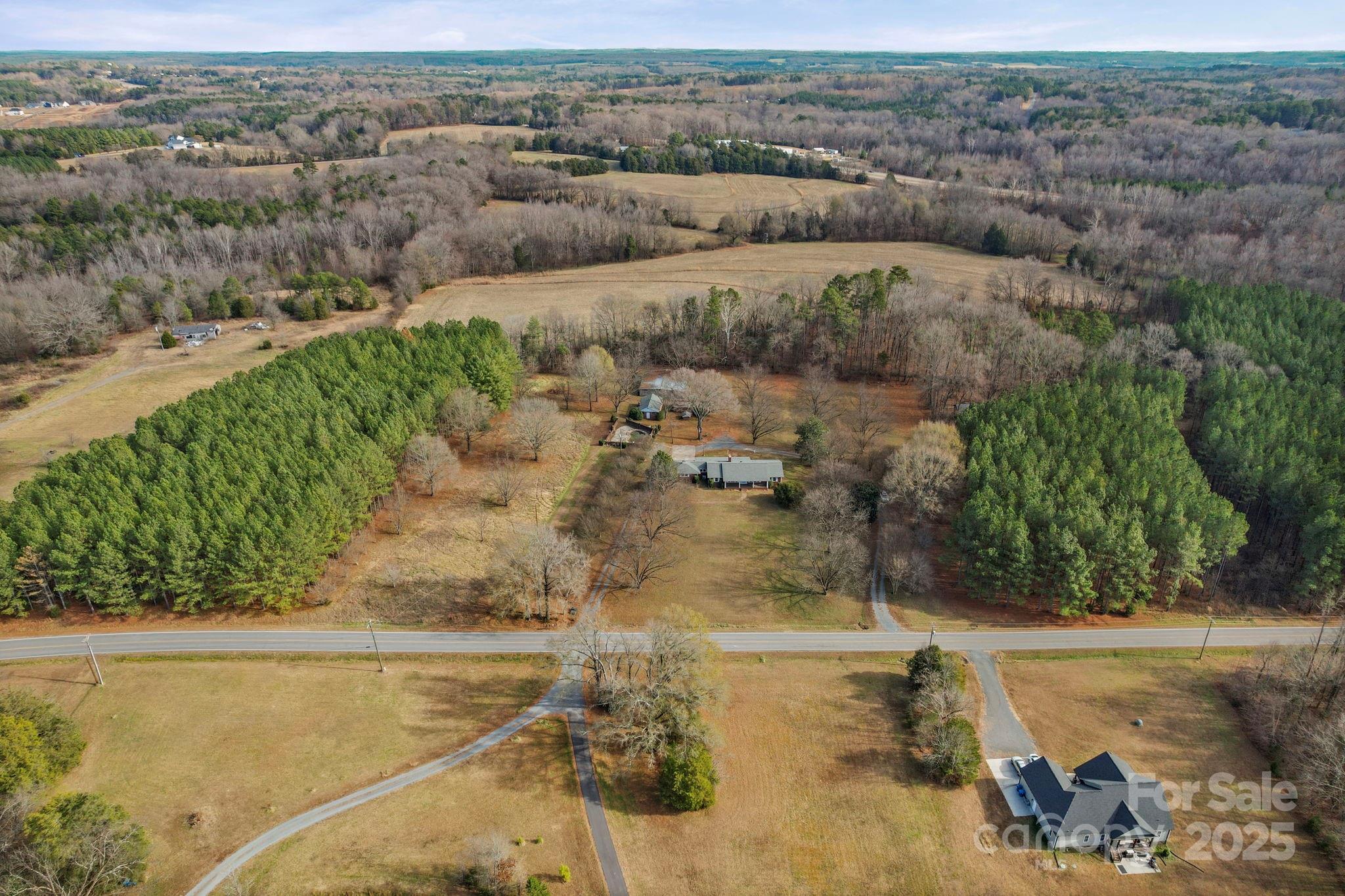 1223 Walker Road Mount Pleasant, NC 28124 - Photo 48 of 48 an aerial view of residential houses with outdoor space