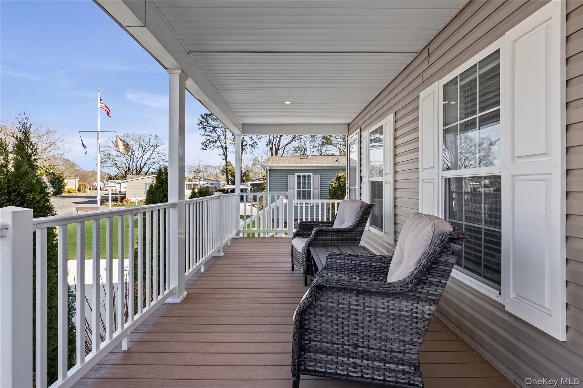 1661 Old Country Road, Unit 351B Riverhead, NY 11901 - Photo 18 of 32 a balcony with furniture