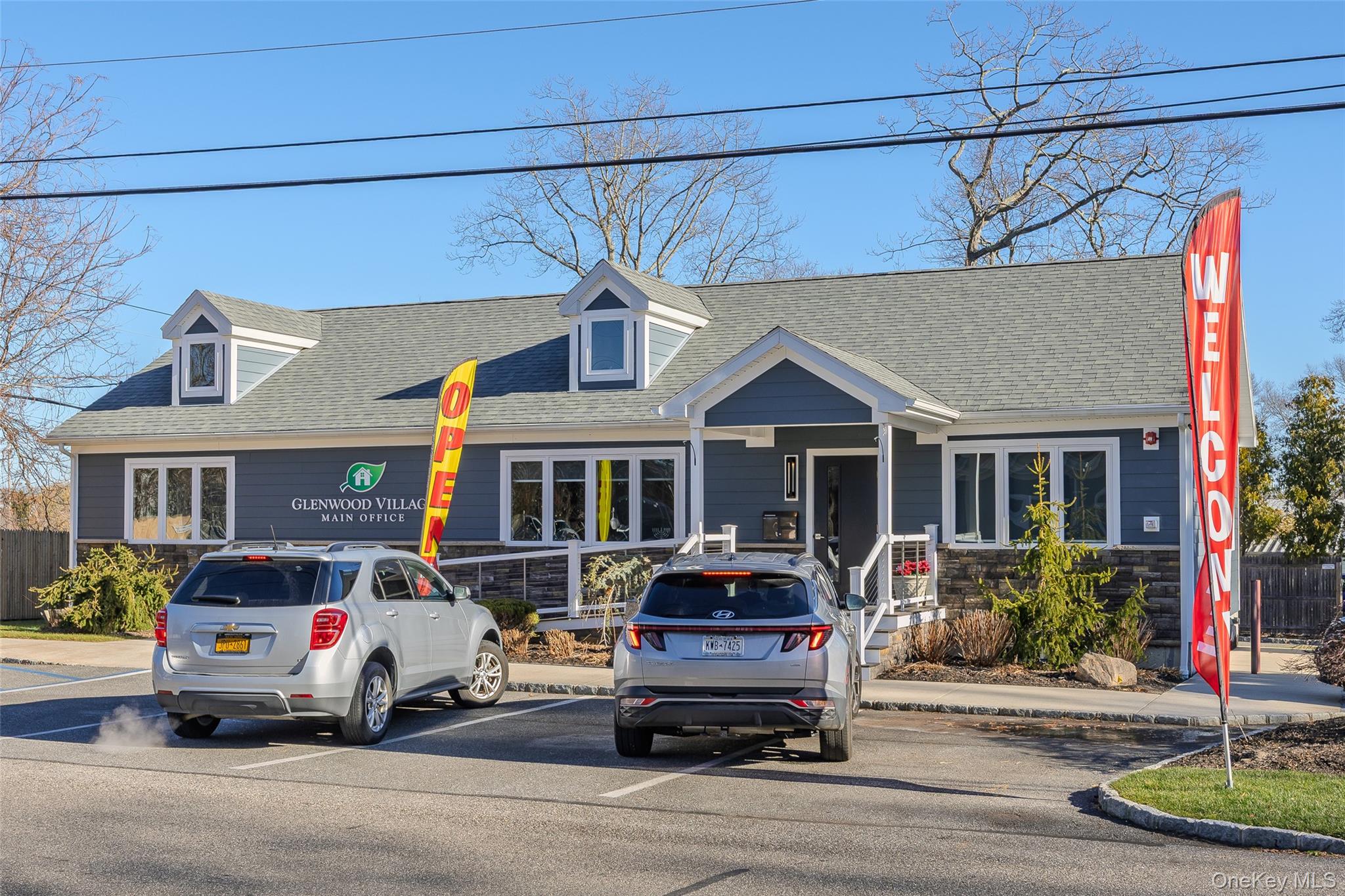 1661 Old Country Road, Unit 351B Riverhead, NY 11901 - Photo 30 of 32 a car parked in front of a house