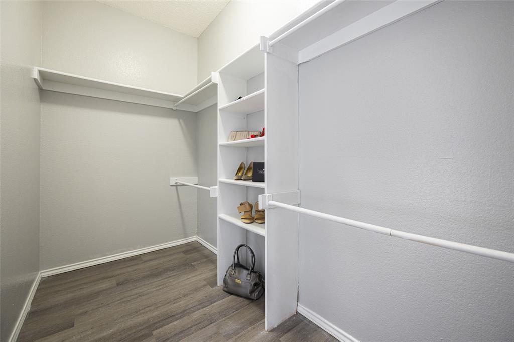 4113 Esters Road, Unit 609 Irving, TX 75038 - Photo 13 of 18 a view of storage and utility room with empty racks