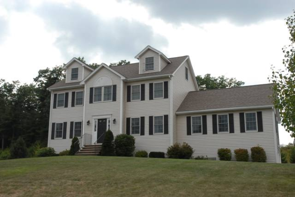 24 Simonds Farm Road Billerica, MA 01862 - Photo 1 of 1 a front view of a house with a garden