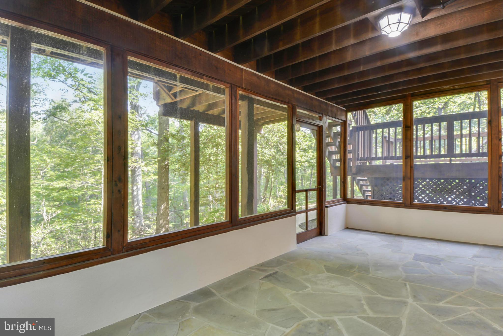 34 Old Sturbridge Road Arnold, MD 21012 - Photo 24 of 30 Lower level Screened Porch off rec. room area.