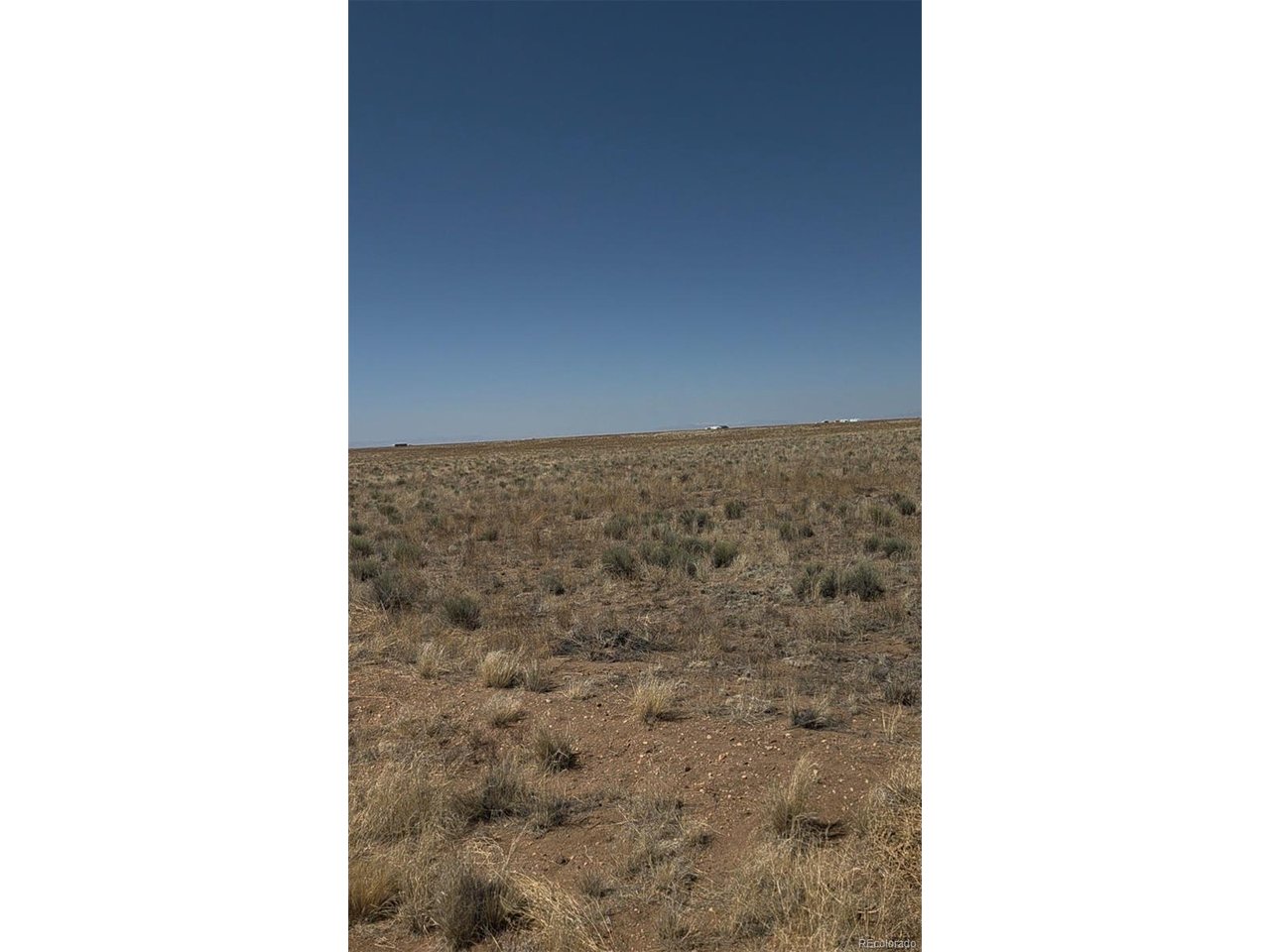 7 Alamosa Road Blanca, CO 81123 - Photo 5 of 8 a picture of a bathroom with a shower