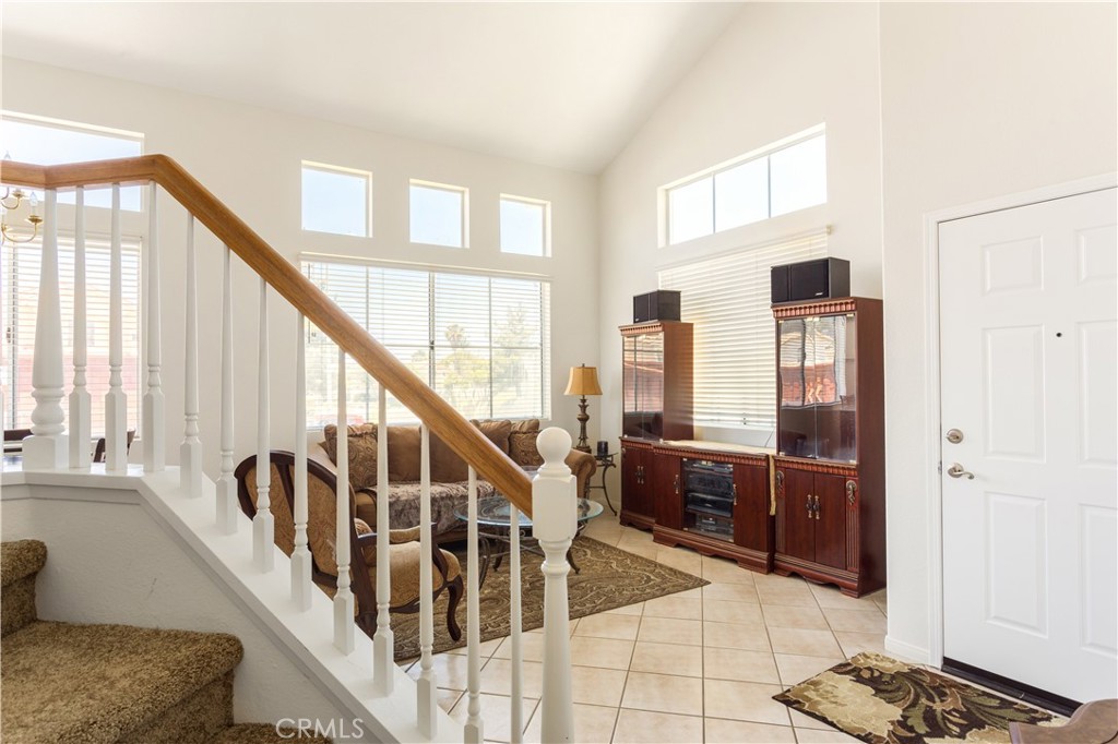 44655 Mill Run Temecula, CA 92592 - Photo 13 of 37 a view of entryway and hall with wooden floor