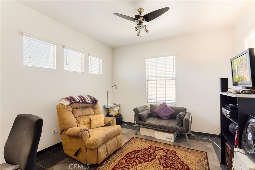 44655 Mill Run Temecula, CA 92592 - Photo 20 of 37 a living room with furniture and a window