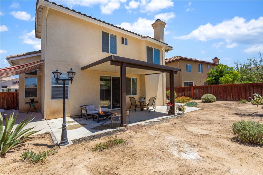44655 Mill Run Temecula, CA 92592 - Photo 33 of 37 a view of a house with wooden fence