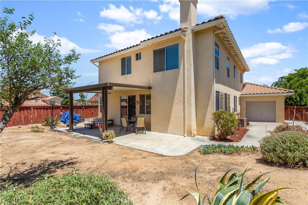 44655 Mill Run Temecula, CA 92592 - Photo 35 of 37 a view of a house with backyard and sitting area