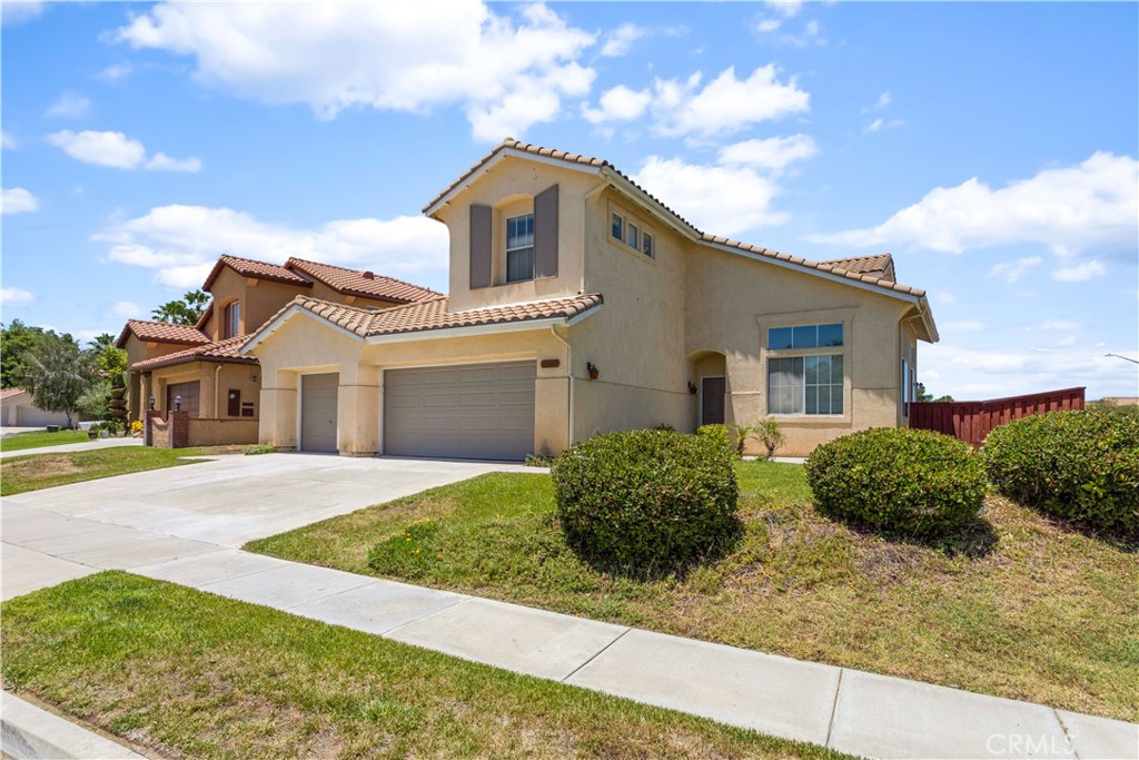 44655 Mill Run Temecula, CA 92592 - Photo 36 of 37 a front view of a house with a yard and garage