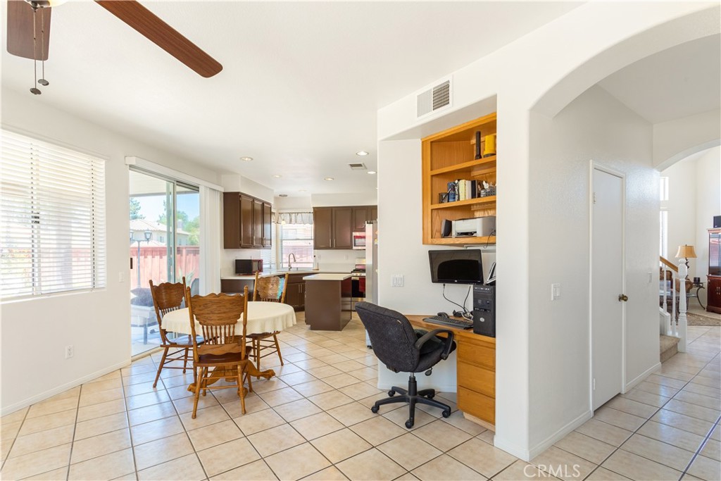 44655 Mill Run Temecula, CA 92592 - Photo 8 of 37 a view of a livingroom with workspace and a window